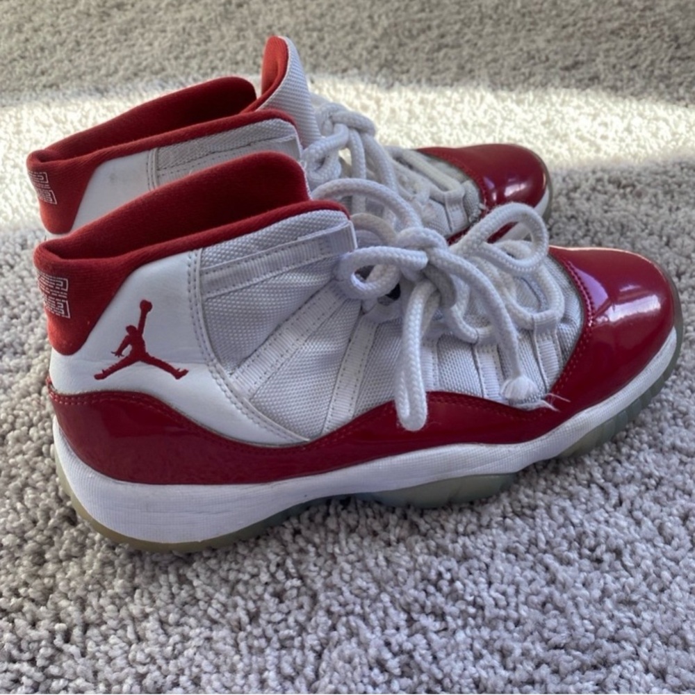 Air Jordan 11 Retro Cherry shoes Size women’s size 8 in used condition